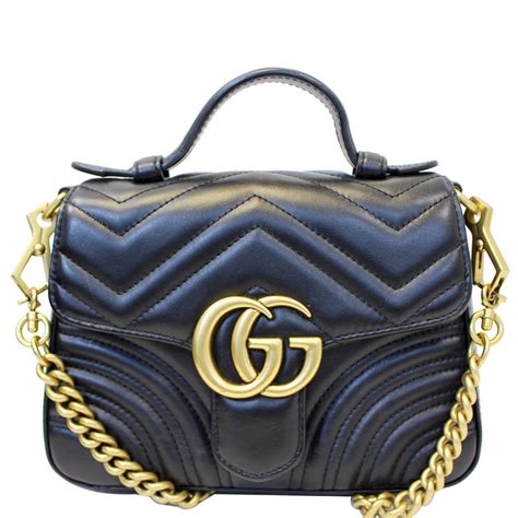 Gucci Swing mini top handle bag in black leather 